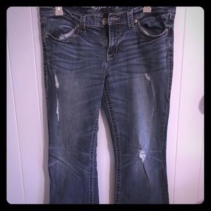 Low Rise Destructed Bootcut Jeans